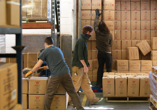 Work Force Inc. serves 3,000 customers and carries 5,000 products stored within two 40,000-square-foot warehouses. Shown, employees unloading product. 